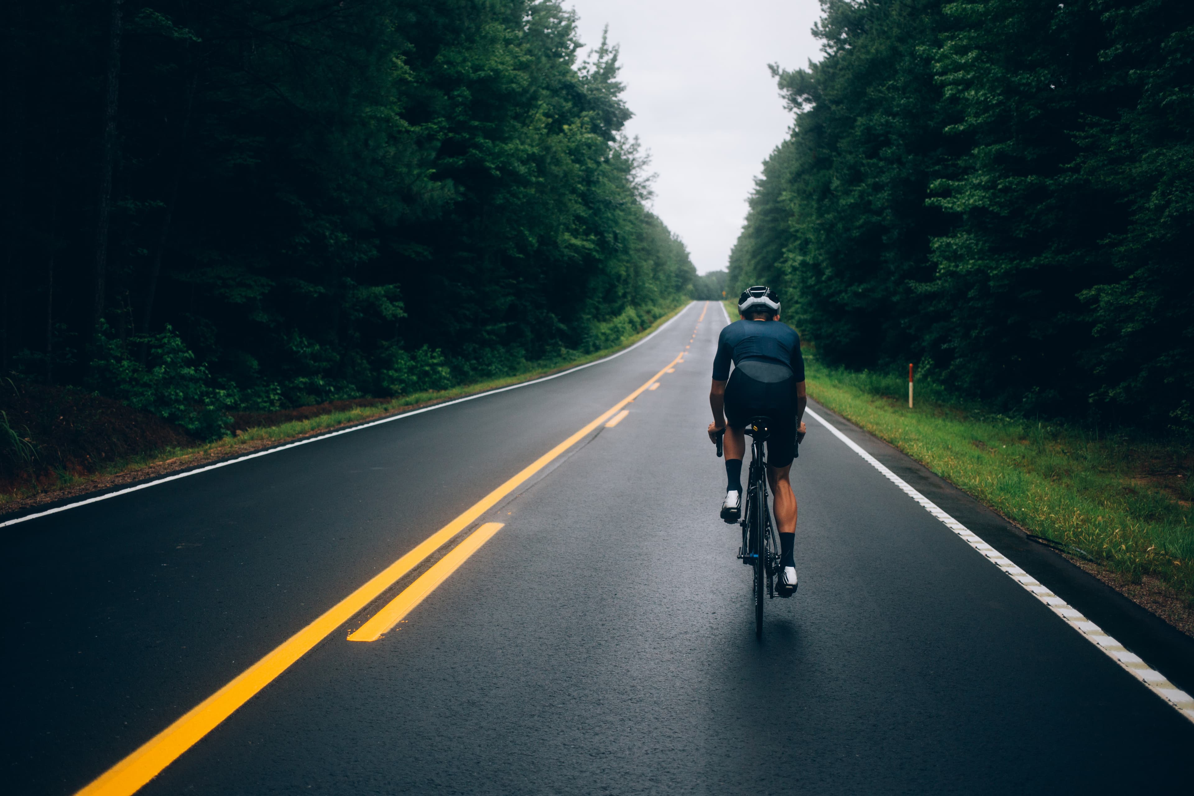 Cyclist in motion representing personalized fit recommendations.